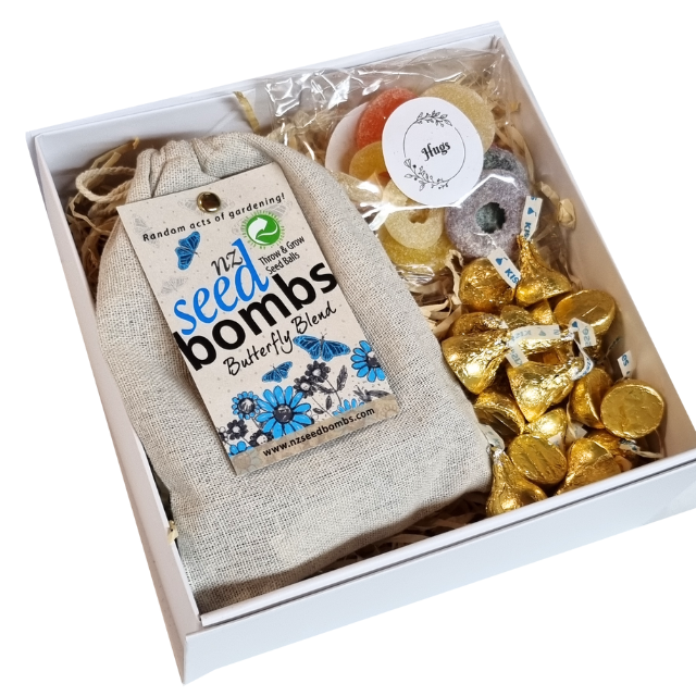 Gift box with butterfly seed bombs, hug lollies and Hersheys kisses