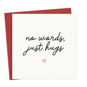 Greeting card white with words "no words, just hugs" and pink heart.  Red envelope.