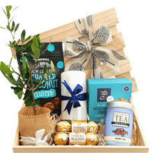 Organic Tea, biscuits and a memorial candle with living tree gift in wooden hamper